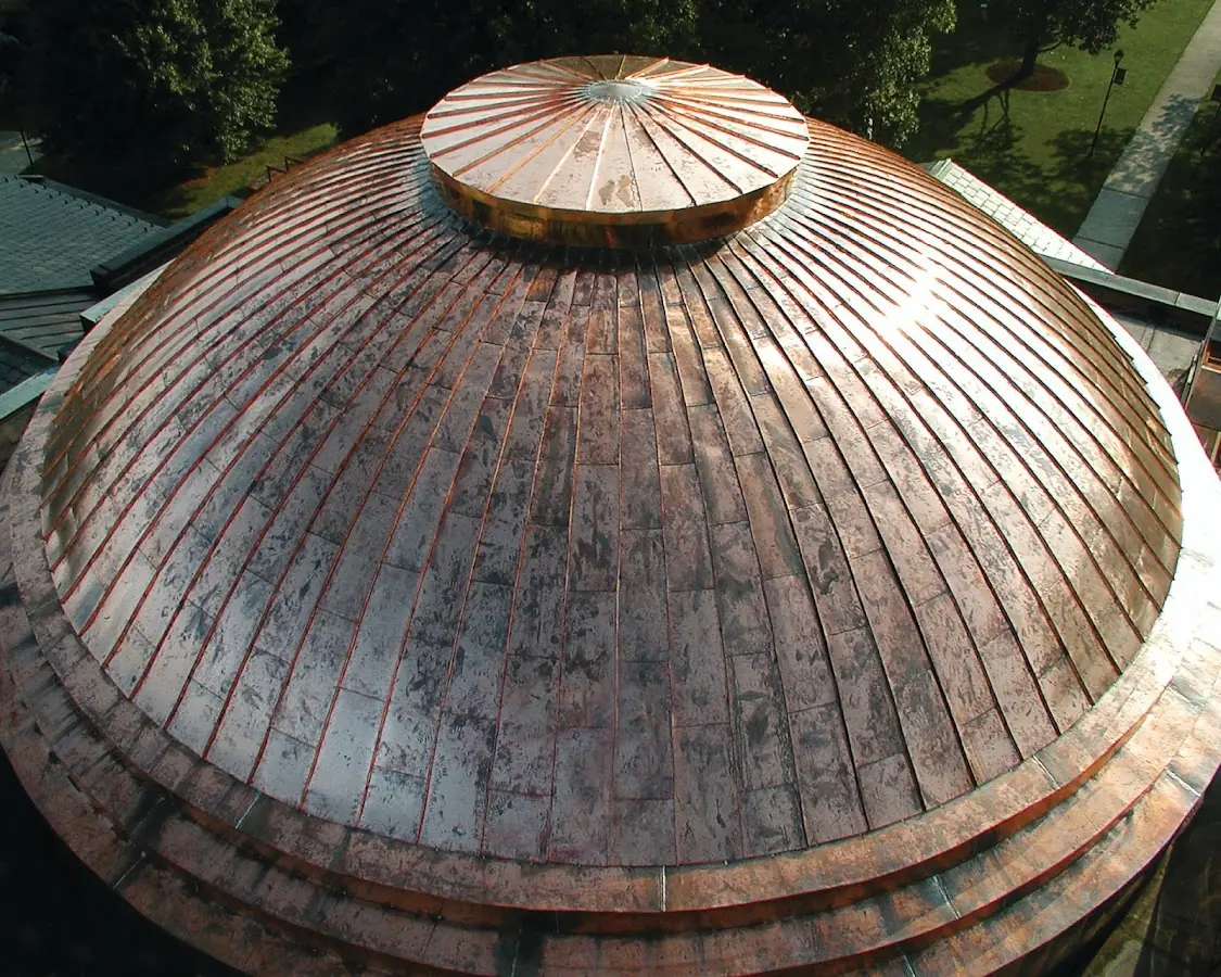 Craftsman Roofing crew installing a new roof in South Truro